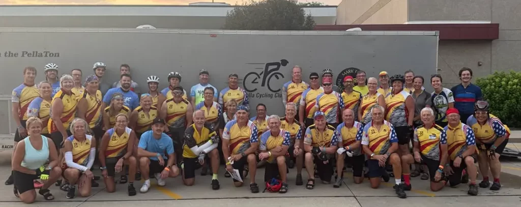 Bikers pose in-front of the PCC trailer